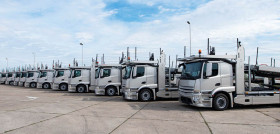 group-of-trucks-parked-in-line-at-truck-stop