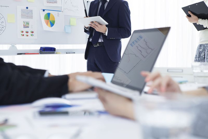 50590941 - young businessman who is in the strategy meeting in the office