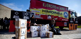 material y alimentos Scania- En ruta solidaria